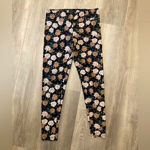 NWOT. Talula leggings. Floral. Size large.